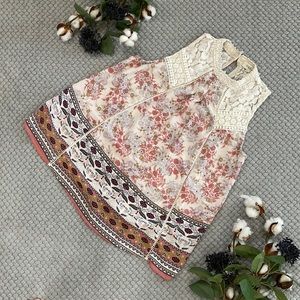 Taylor and Sage brand flowered sleeveless top. Size small.